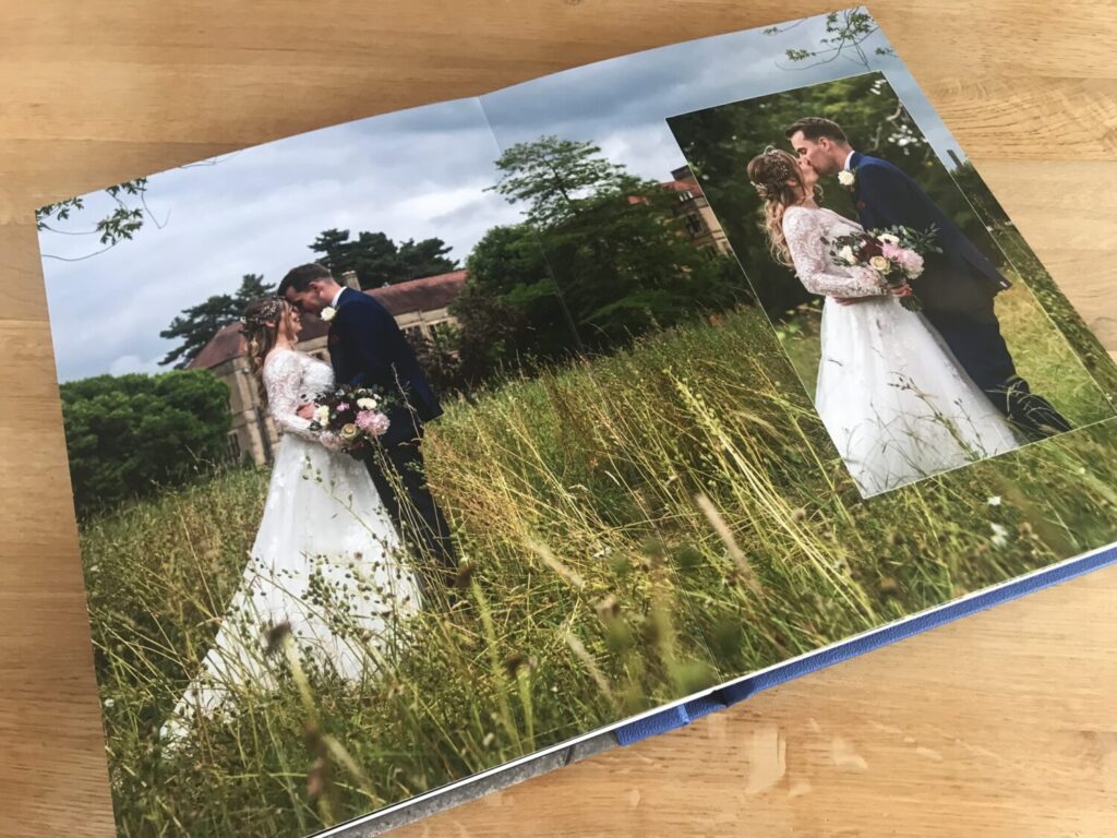 lay flat professional photo style printed photograph book, loxley, royal blue finish, fanhams hall background, long grass, romantic, preferred supplier