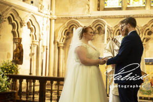 bride groom exchange vows, st albans abbey