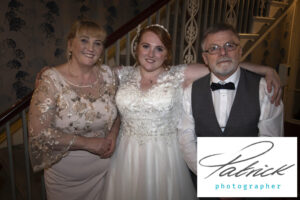 bride, bride mum, bride dad, end of evening, relaxed image, bride hugs parents