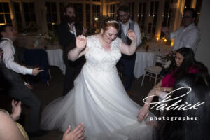 bride dancing, swirly dress, eve shot