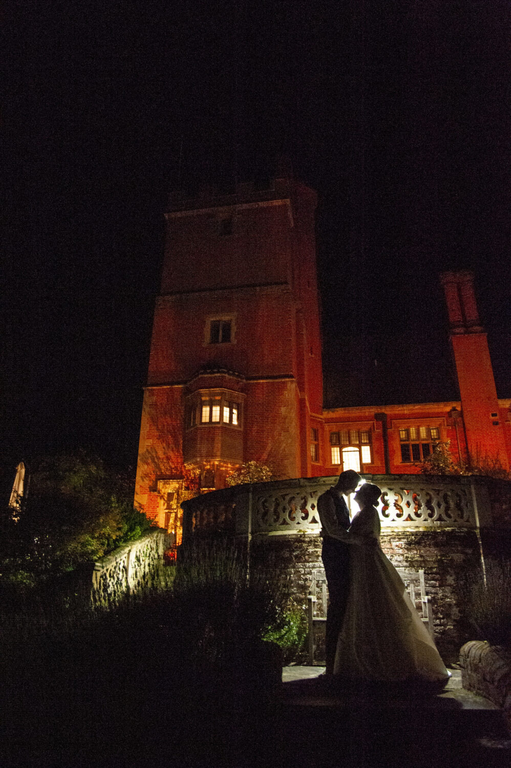 lanwades hall, bride and groom silhoutte, atmospheric lighting, low level aspect
