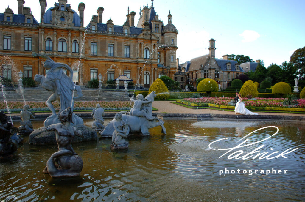 exterior Waddesdon Manor, bride and groom, lake, pond, gardens, cherubs, fountains, trees