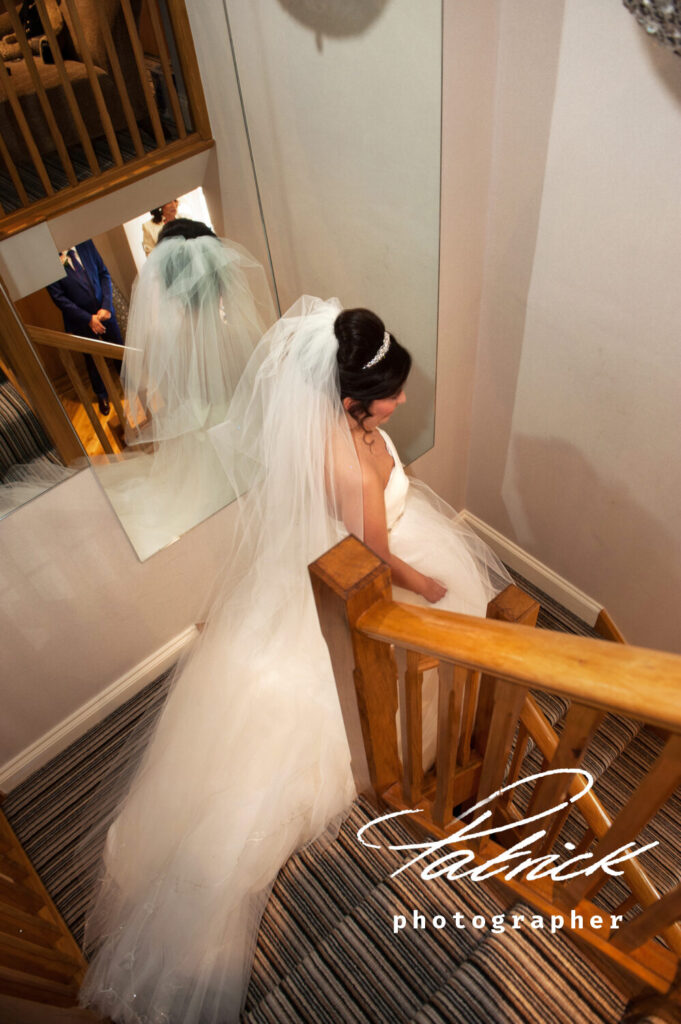 bride walking downstair st Michaels manor