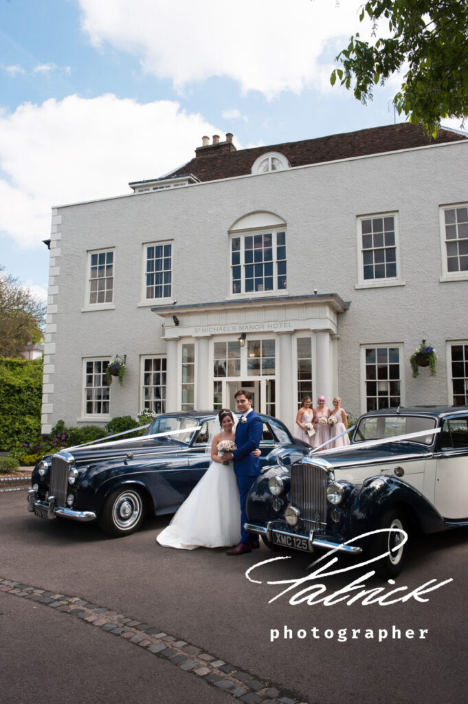 st Michaels manor exterior shot front of building, rolls royce, wedding car, bride and groom