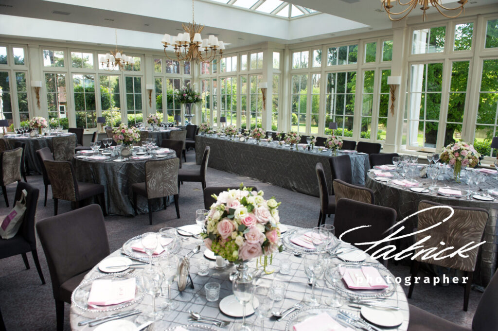 interior conservatory st Michaels manor wedding breakfast tables bouquet