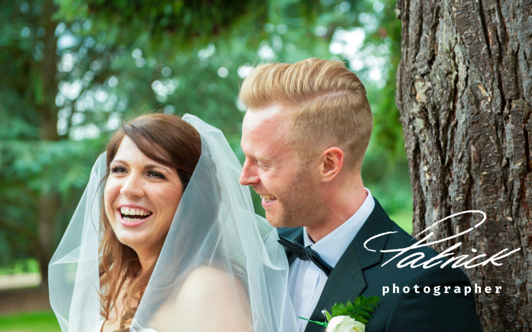 bride and groom sharing a moment in the grounds of Hanbury Manor in Ware Capturing Authentic Moments Naturally