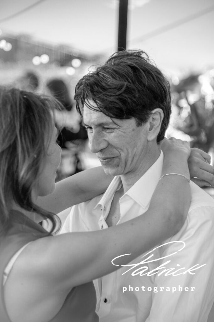 focus on groom first dance looking at wife wedding black and white image