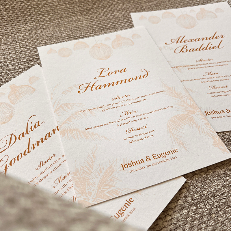 spread of bespoke wedding stationery, personalised for joshua and eugenie's guests