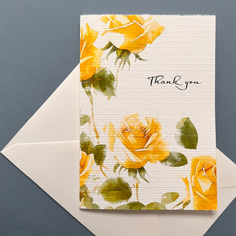 thank you card floral yellow and green and Typography design, white envelope in background