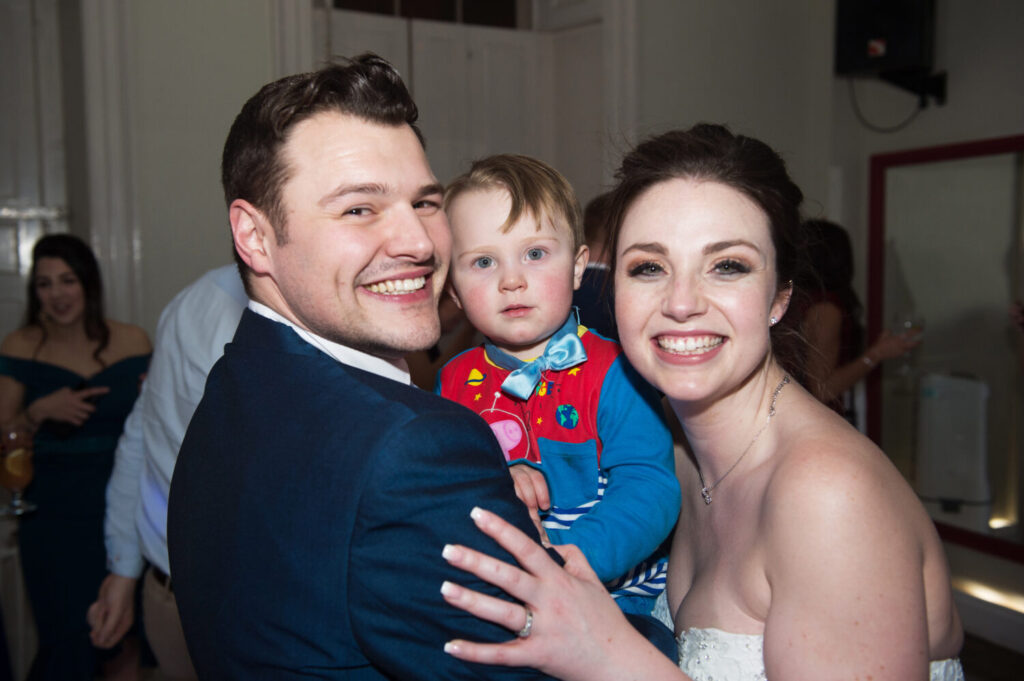 groom, page boy, bride, relaxed shot